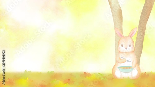 紅葉の絨毯に座ってスープを食べるうさぎのループアニメーション。コピースペース付きの秋らしい水彩フレーム。