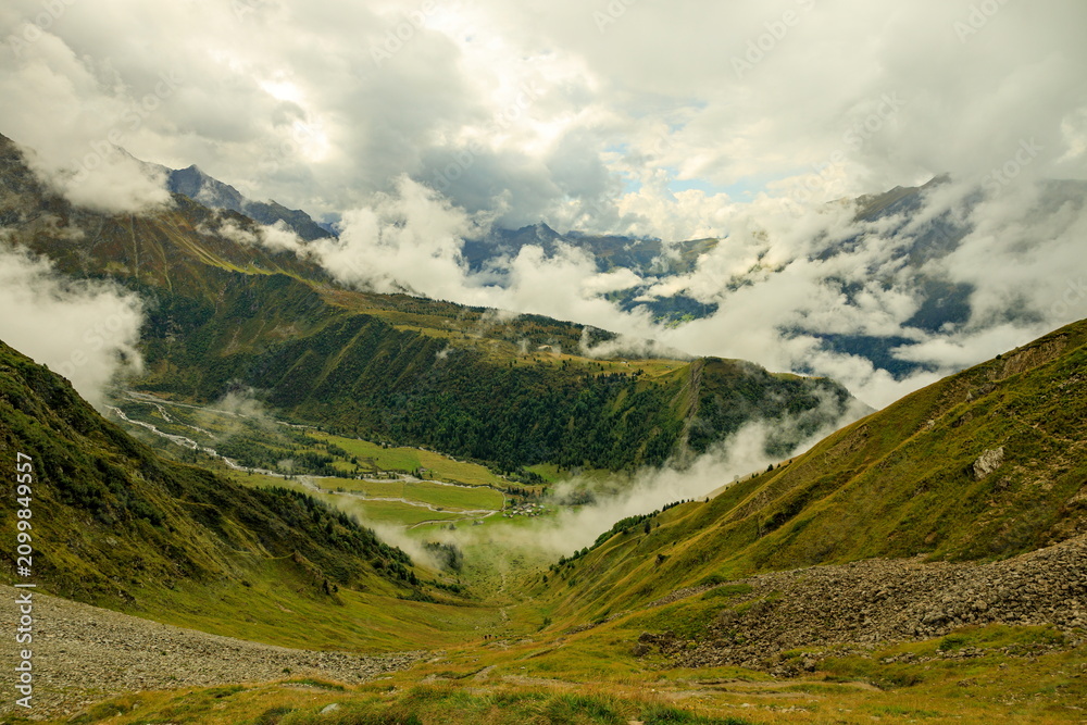 Fototapeta premium Col de Tricot, France - 10.09.2025: Dramatic View of the Alpine Valley