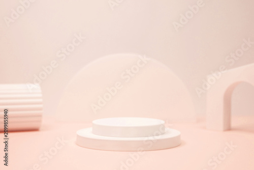 Minimalist Product Display Podium with Geometric Shapes on Peach Background