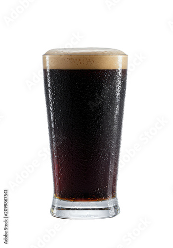 A majestic, frosty glass stein filled with dark effervescent stout beer and a thick creamy foam head, macro close-up on reflective white studio background. Concept for beverage advertising