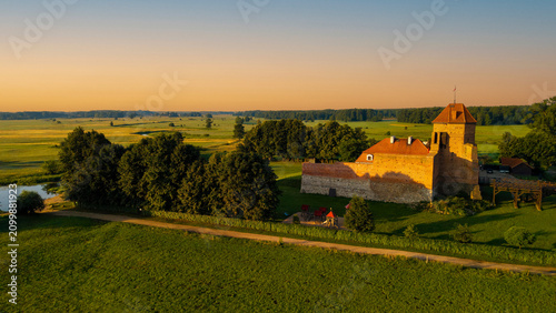 Принти на полотні Medieval castle and Liwiec river in Liw, village in Wegrow County, Masovia region of Poland