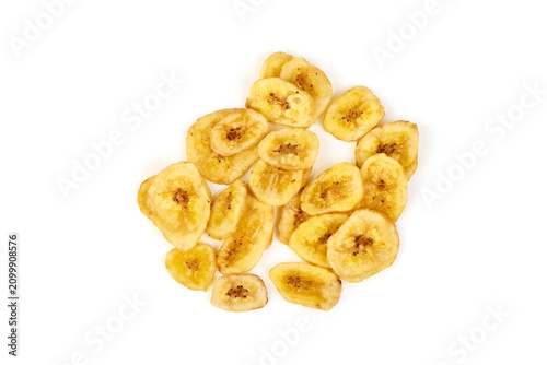 Dried banana chips isolated on white background