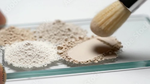 Close-Up Application of Textured Powders Using Brush on Glass Plate for Beauty and Art Cosmetics