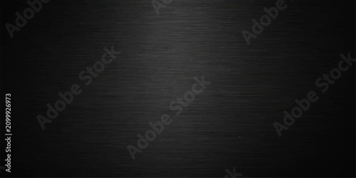 Dark brushed metal texture background with a scratched stainless steel plate surface design