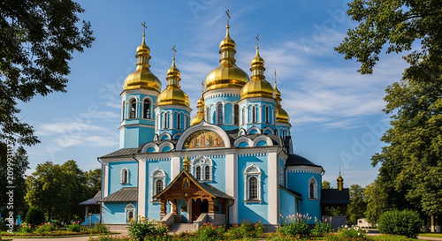 Azure Ukrainian Orthodox Cathedral with Golden Domes, Blue Sky