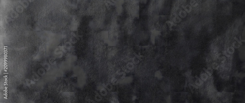 Photography Concrete texture background showing a mottled dark gray surface with cloudy patc
