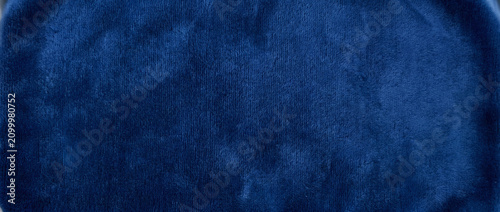 Cuadro en lienzo Velvet texture background presenting a rich navy blue fabric surface with soft v