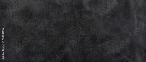 Foto Black texture background featuring a rough charcoal surface with faint smoky pat