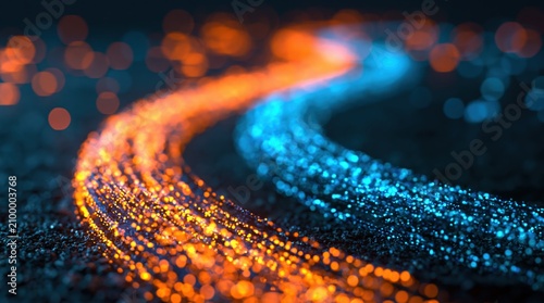 Abstract background with glowing orange and blue light particles in dynamic trails