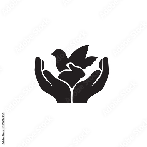 Fotografía Black silhouette of hands holding a bird and a rabbit