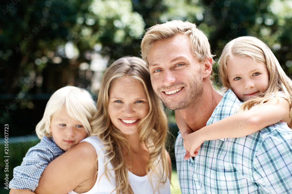 Fototapeta premium Piggyback, park and portrait of parents with children for summer holiday, weekend and family outdoors. Love, nature and happy mother with father, kids and smile for bonding and relax in together