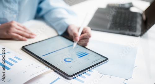 Business Data Analysis Dashboard On Digital Tablet With Financial Reports