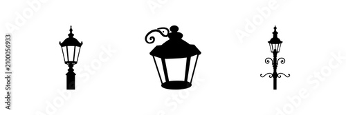 Fotografie Solid black silhouette of an old-fashioned street lamp, Victorian urban symbol, high contrast, white background