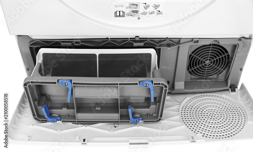 Open clothes dryer maintenance door with condenser lint filter isolated on transparent background PNG