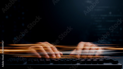 Long exposure typing hands motion blur streak lower clean dark upper, developer speed
