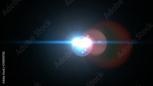 Bright blue lens flare and optical light effect with glowing starburst on a dark black background, ideal for futuristic designs