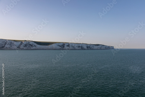 Obraz na płótnie The white cliifs of Dover from the English Channel as dusk falls on a calm May e