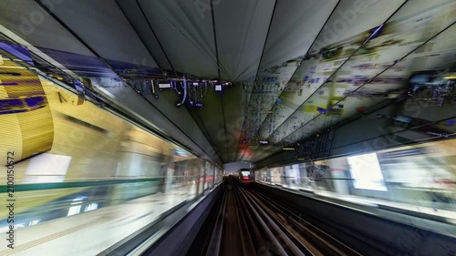  hyperlapse shot of the dubai metro with abstract light trails