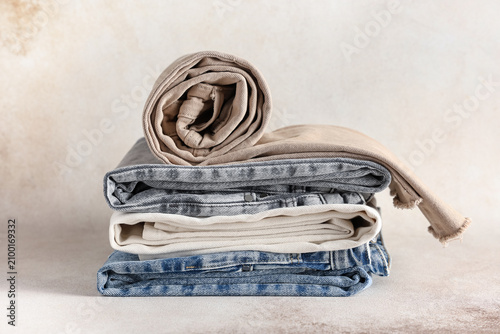 Stack of folded and rolled ...