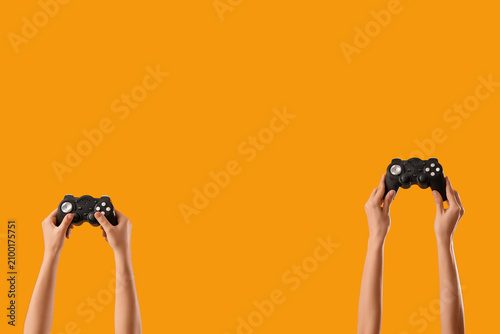Female hands with game pads...