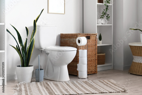 Toilet bowl, laundry basket...