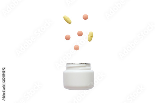 White plastic pill bottle with pink and yellow pills levitating above it, isolated on transparent background, png