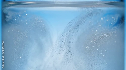 Intricate Underwater Bubbles Creating Unique Patterns in Clear Water with Blue Gradient Background for Commercial and Educational Use