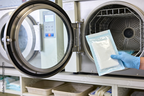 Tableau sur toile Sterilization process in a medical facility with autoclave and sterile packaging