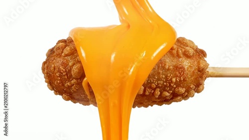 Mouthwatering Cheese Stick Drizzled with Melted Cheese Sauce on Bright White Background Ideal for Tasty Food Advertising and Promotions