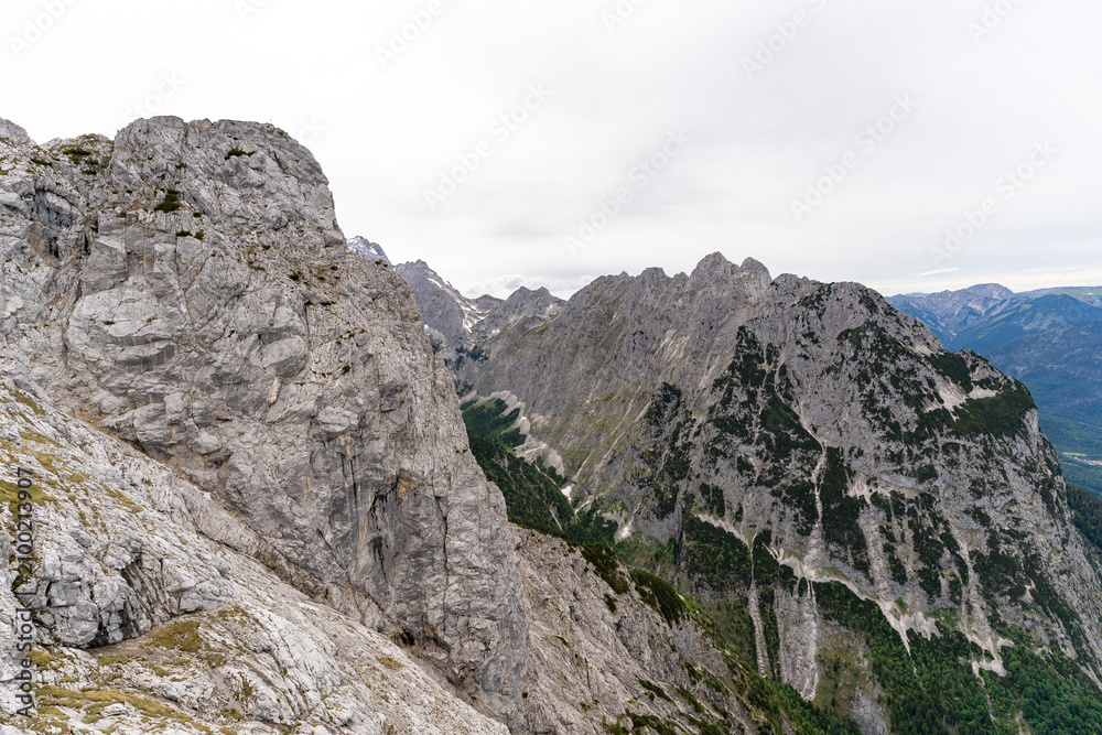 Fototapeta premium Dramatic Alpine Landscape with Rugged Rocky Peaks