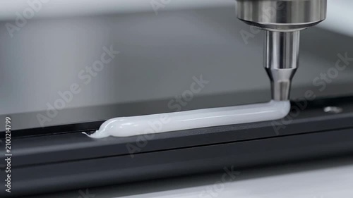 Precision Adhesive Application With High-Tech Machinery Showcasing Industrial Manufacturing Techniques