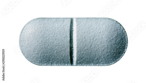 Obraz na płótnie Isolated oblong blue-green medicine tablet with a score line, close-up texture v