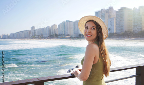 Brazilian girl on promenade viewpoint in Guaruja coastal city of Brazil, South America
