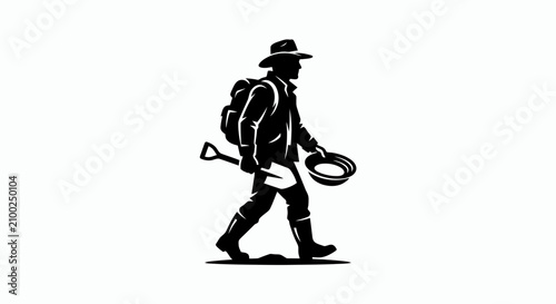 man walking with backpack and shovel.