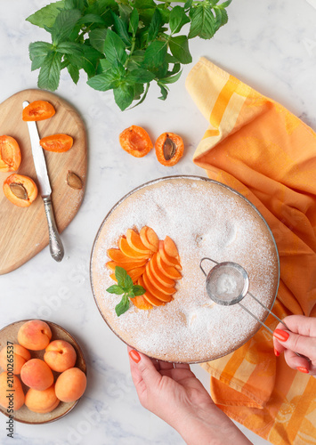 Homemade apricot pie. Charlotte. Fresh delicious pastries. Selective focus, top view
