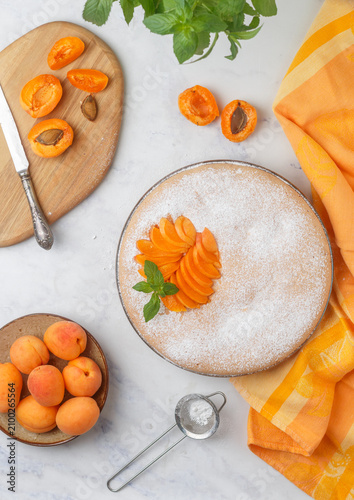 Homemade apricot pie. Charlotte. Fresh delicious pastries. Selective focus, top view