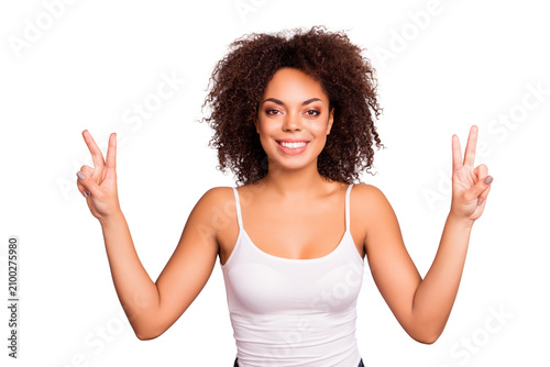 Cuadro en lienzo Portrait of cheerful, attractive, charming, pretty, nice, positive girl showing
