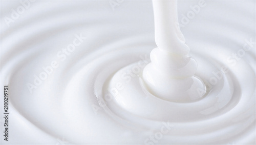 Konstfotografi Thick white liquid pouring and swirling, creating ripples, abstract creamy texture