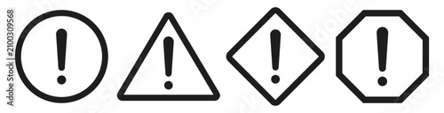 Fotografía Four warning icons with exclamation marks are shown in different geometric shapes