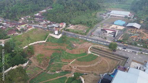 Aerial Drone Footage of Rural Farmland and Industrial Area in Tropical Landscape