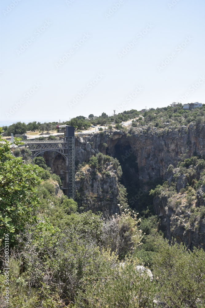 Fototapeta premium Observation Elevator and Viewing Platform Over Cennet Cehennem Sinkholes in Mersin, Turkey