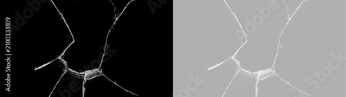 Foto Broken glass with large central hole and cracks