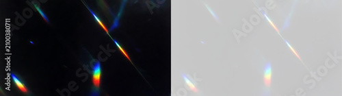 Rainbow prism light leak and refraction effects with sharp diagonal streaks. Vibrant spectral colors on black and transparent background. Abstract overlay design element