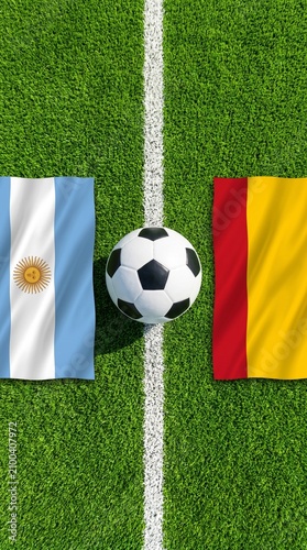 Top down vertical view of a classic soccer ball on field white line with Argentina and Spain flags on green grass