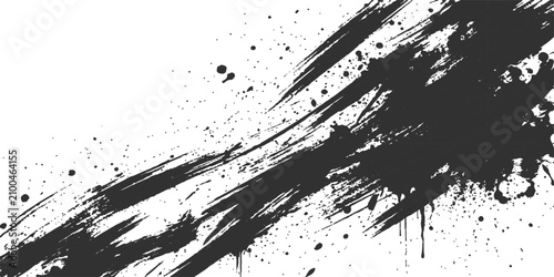 Black ink splatter and brush strokes across a white background with selective focus creating dynamic abstract texture