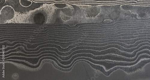 Surface of the Damascus steel blade with a unique wavy pattern
