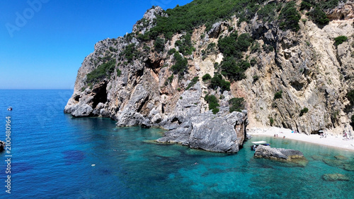 Cuadro en lienzo Aerial view of the wild Gyali beach in Corfu, Greece, with dramatic high cliffs and crystal clear turquoise sea