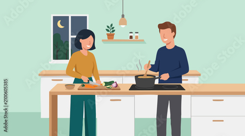 Принти на полотні Happy couple cooking dinner together in kitchen at night, preparing meal