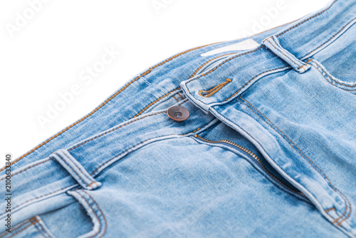 Blue jeans denim trousers close up isolated on white background