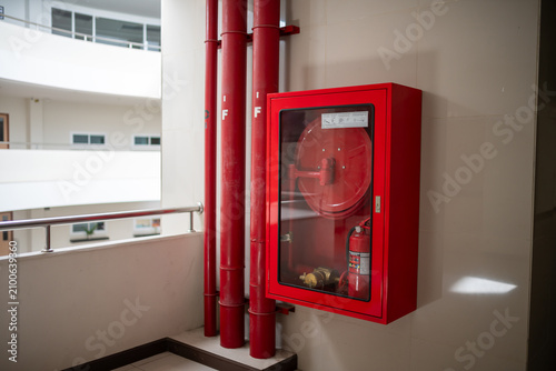 Red Fire Safety Cabinet on Wall in Building
